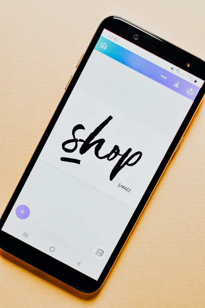 Close-up of a smartphone screen with a Shop application interface on a light background.